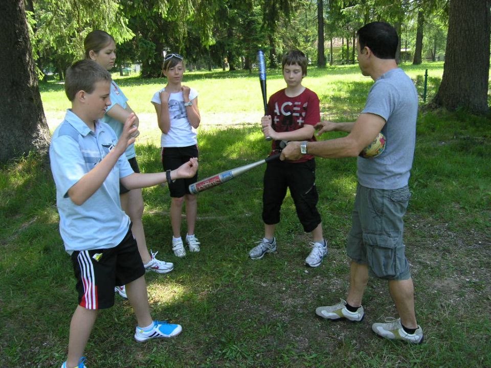 Ernie's explaining the rules to the older children.