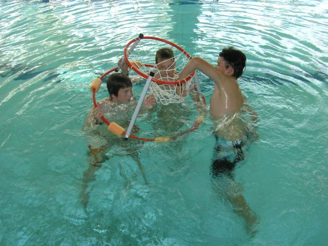 The boys had their own thing going on in the other pool.