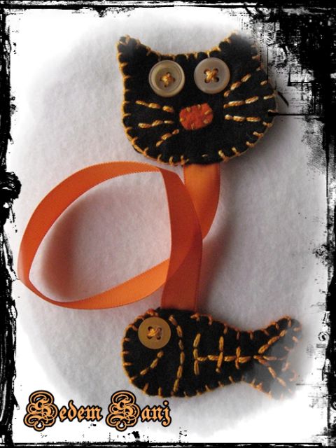 Črn mačkon - oranžen