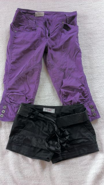 Vijolične kapri hlače št.34 in črne kratke hlače št. 32