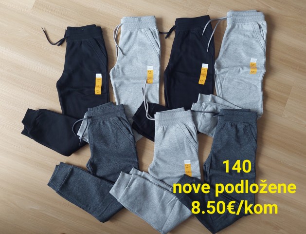 Nove nenosene podložene trenerke velikost 140 - foto