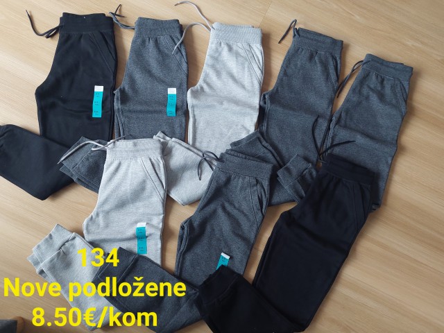 Nove nenosene podložene trenerke velikost 134 - foto