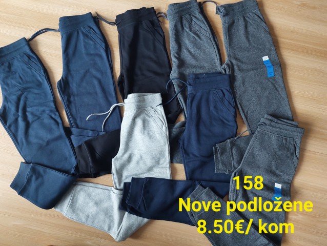 Nove nenosene podložene trenerke velikost 158 - foto