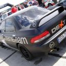 Klasična Impreza poštrihana v mat črno